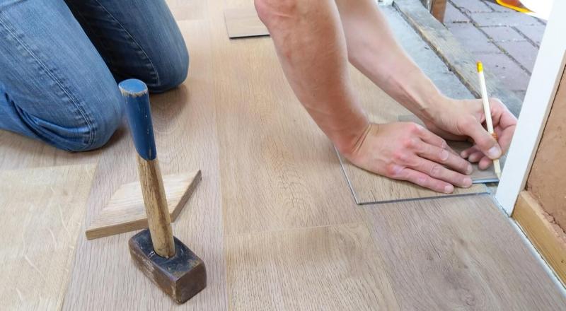 Carpenter installing a floor